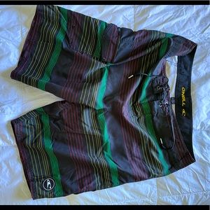 O’Neill size 34 Boardshort, 21” length. Rasta colors.
